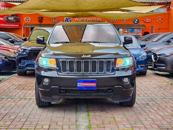 JEEP GRAND CHEROKEE LAREDO DE AGENCIA BLINDAJE 3 PLUS M.2009